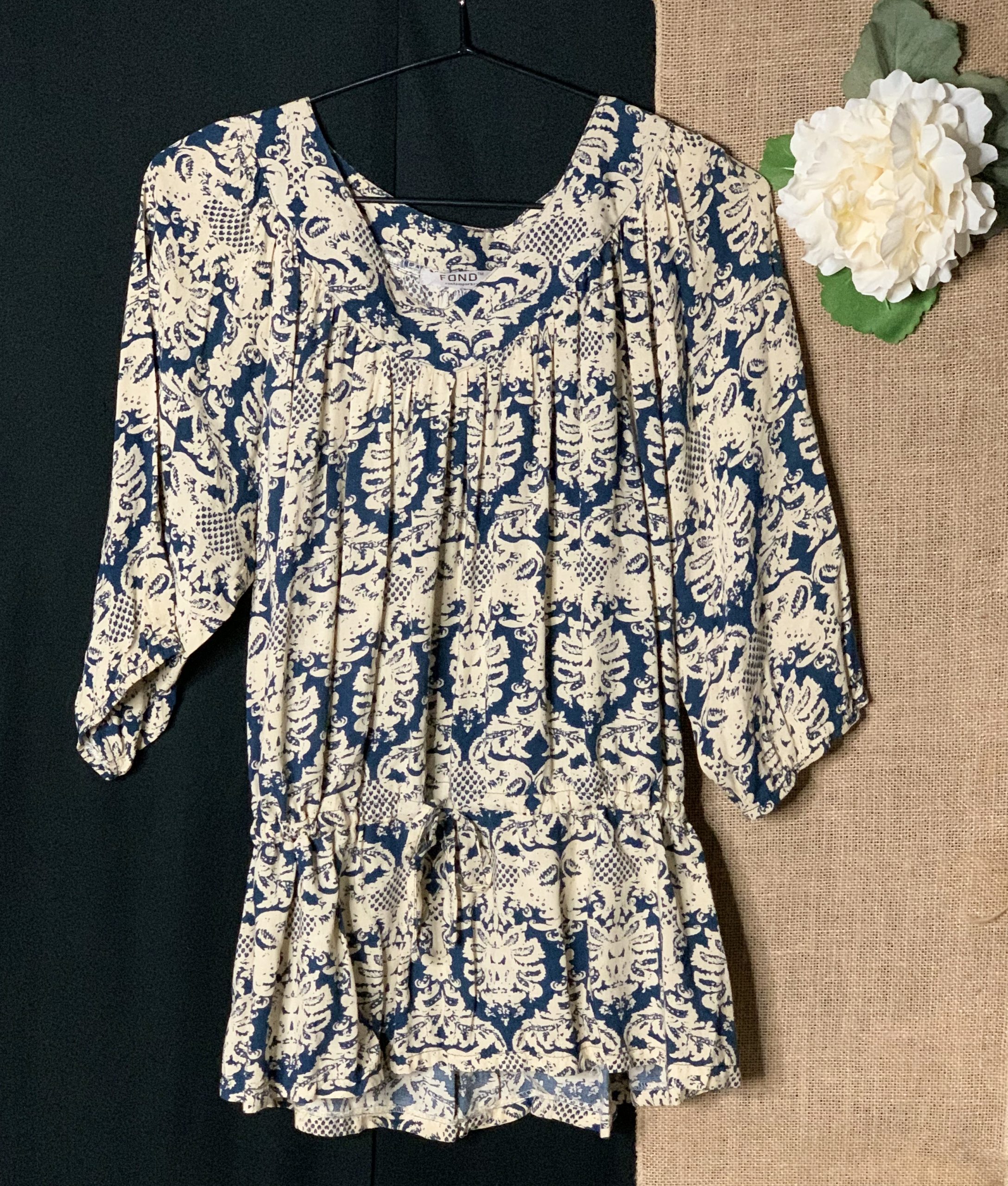 blue flowery blouse